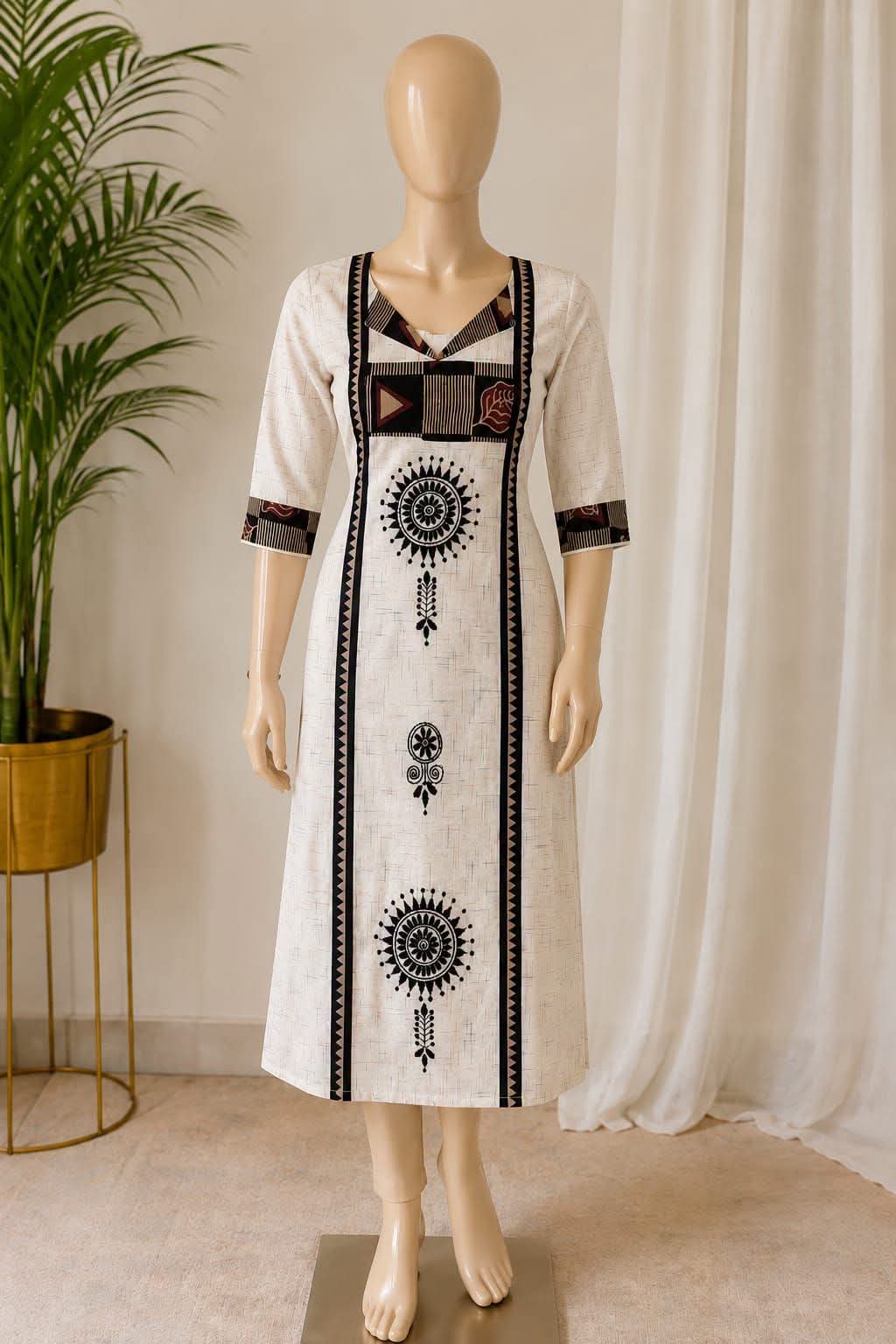 White tribal block-print straight kurta on mannequin